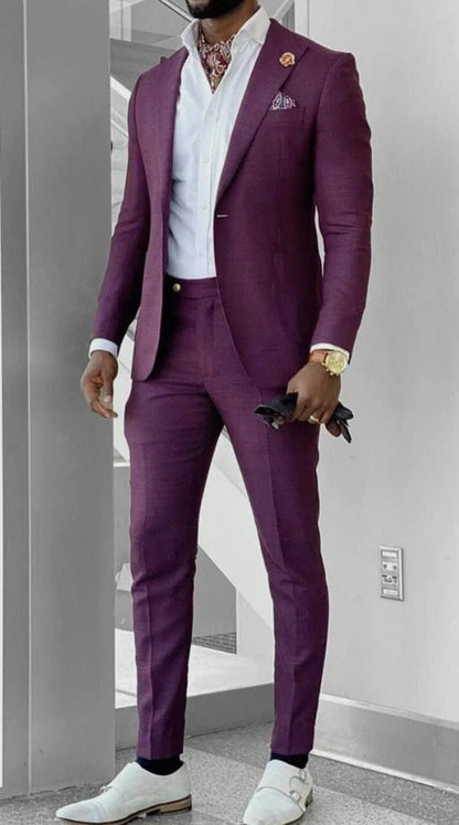 Striking Purple Two-Piece Suit with Peak Lapels and Tailored Craftsmanship