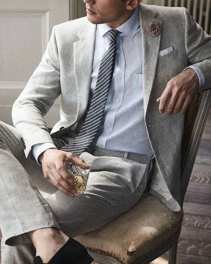Grey Slim-Fit Two-Piece Suit with Surgeon Cuffs – Redefining Modern Elegance
